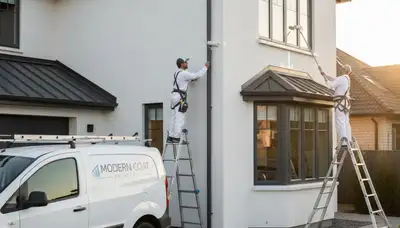 Professional trim and fascia painting on Charleston SC coastal home exterior by expert painters